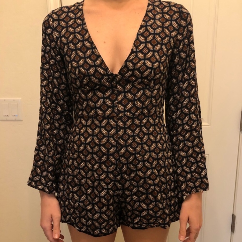 Deep v romper. Stylish and trending